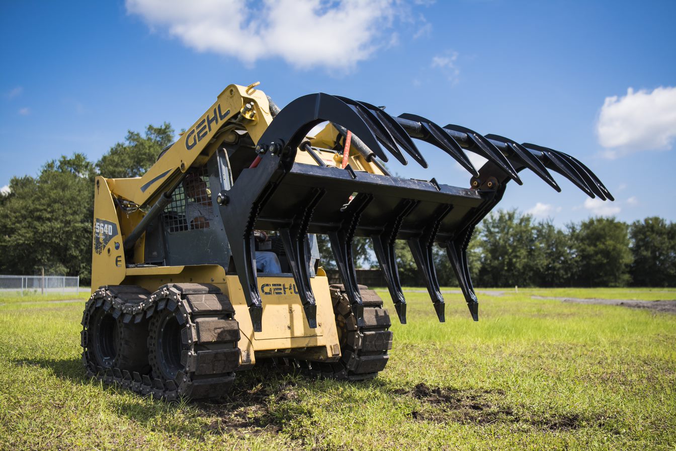 log grapple bucket on gehl skid steer