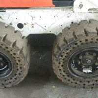 McLaren Nu-Air Tires on Bobcat S175 in metal recycling